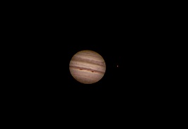 Jupiter - Two Storms and IO Completing a Transit  by Terry Riopka